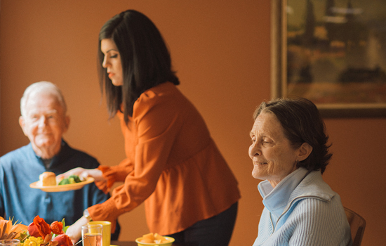 Senior residents being served lunch at Summerfield of Stockton Memory Care in Stockton, CA
