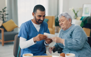 Nursing home, photo album and caregiver with old woman in retirement.